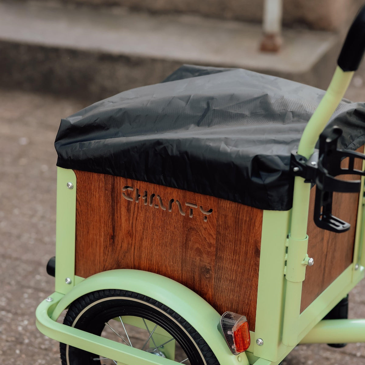 Regnskydd för barnlastcykel